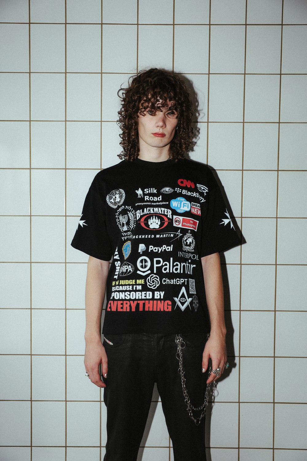Close-up of the Sponsored by Everything tee showing the front print
